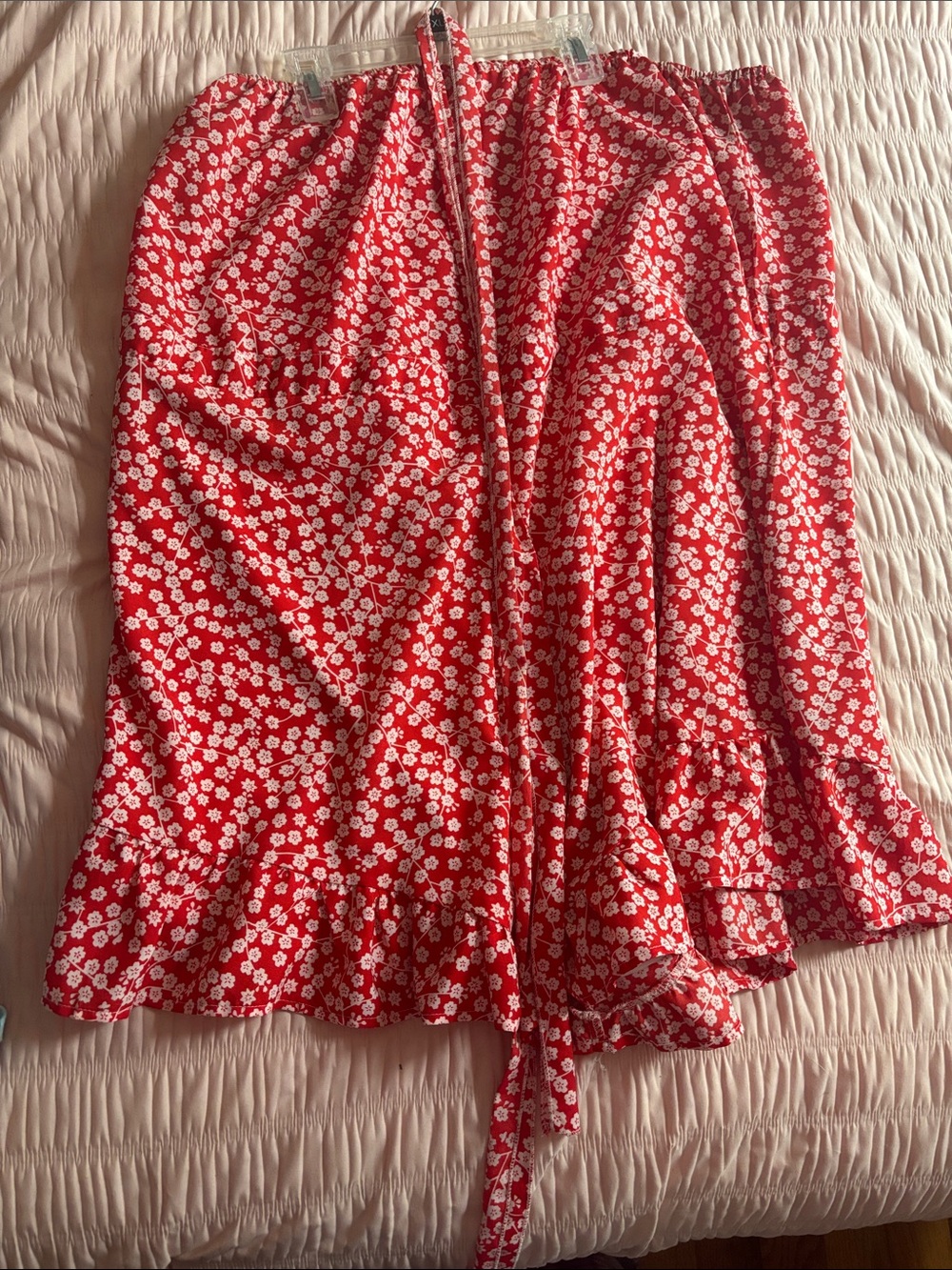 Red and white floral sleeveless romper with tie waist